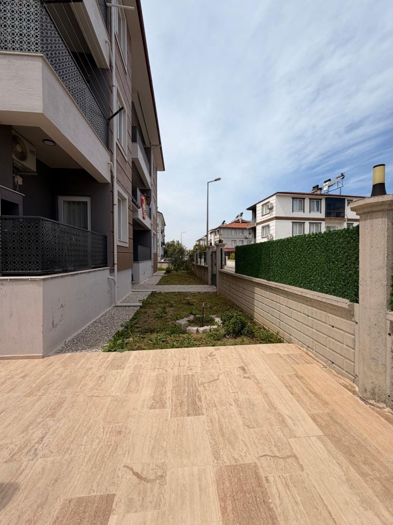 DALAMAN HÜRRİYET MAHALLESİNDE HAVUZLU SİTEDE KİRACILI SATILIK YATIRIMLIK DAİRE