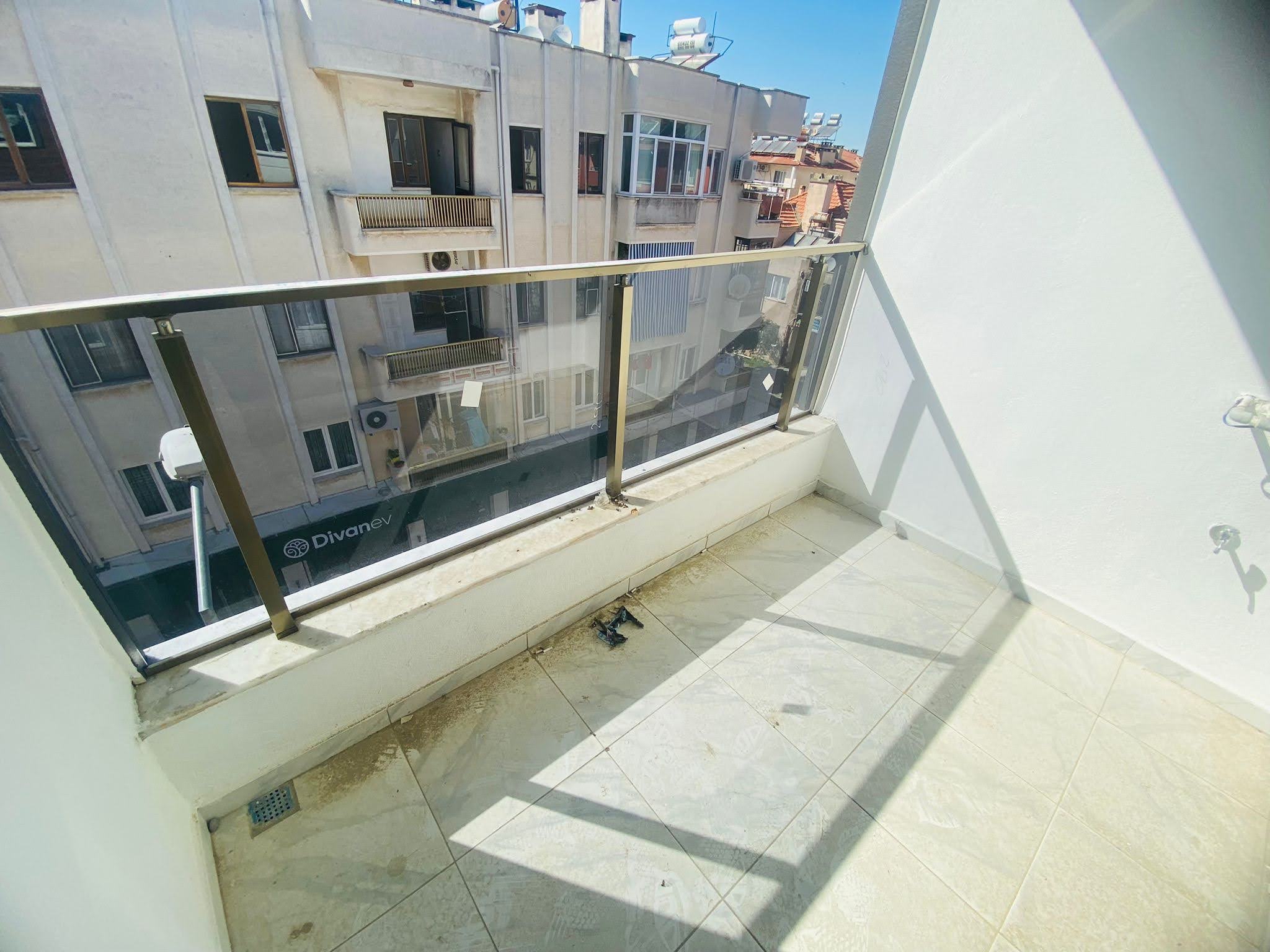 Dalaman Merkez'de Kiracılı Satılık 2+1 Yatırımlık Daire