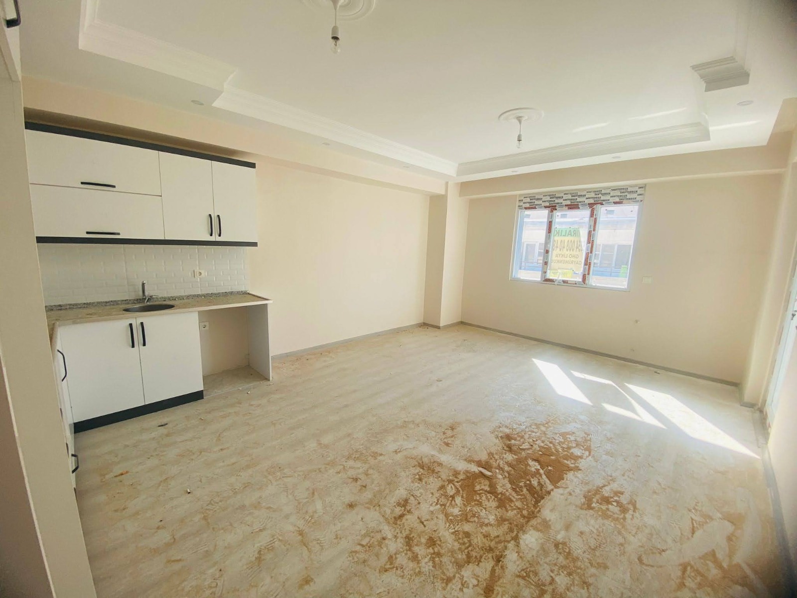 Dalaman Merkez'de Kiracılı Satılık 2+1 Yatırımlık Daire